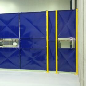 Blue welding cell with viewing cutout panels