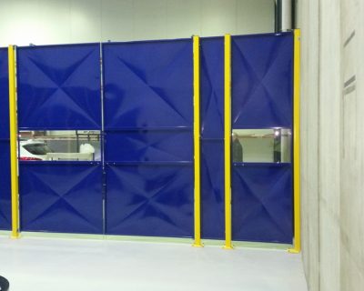 Blue welding cell with viewing cutout panels