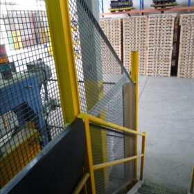 Incline industrial fencing for stairs to platform