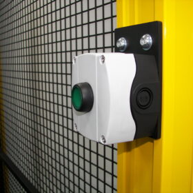 Push button in enclosure on post