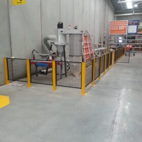 Short 1m high mesh fencing around a saw for customer safety