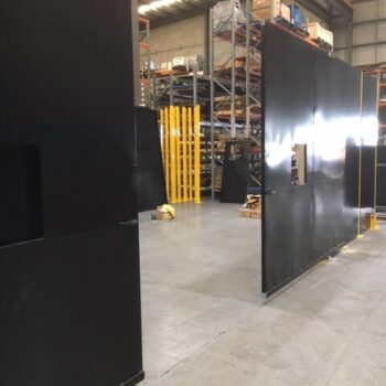 Outside view welding cell with 4m opening open door position